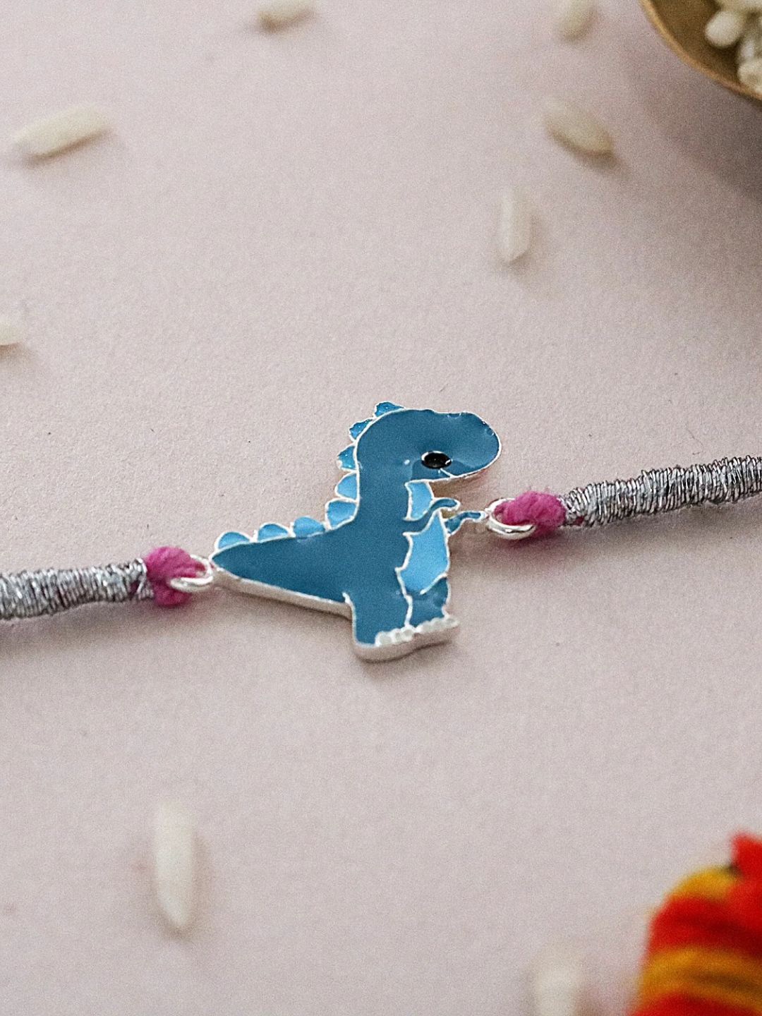 

fnp 925 Silver Whimsical Dinosaur Rakhi Traditional Kundan, Blue