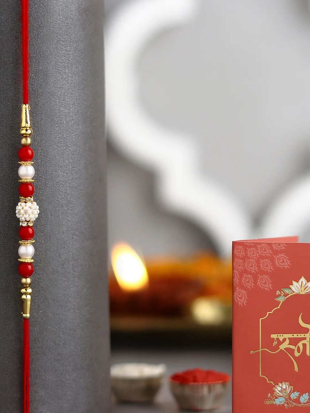 

fnp Luminescent Luster Pearl Rakhi Silver Selections, Red