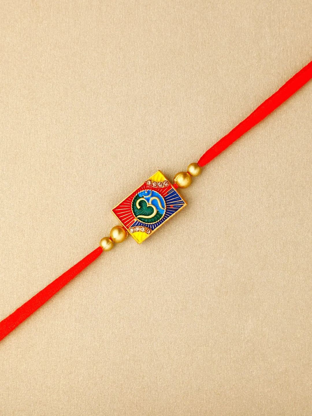 

fnp Eternal Om Blessing Rakhi Kids Collection, Red