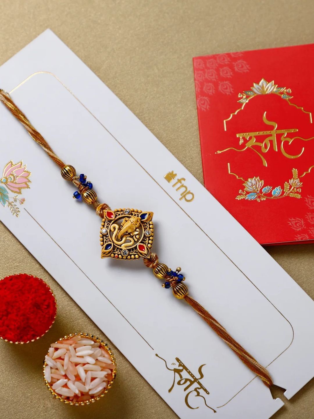

fnp Celestial Ganesha Serenade Rakhi Bracelet Rakhis, Gold