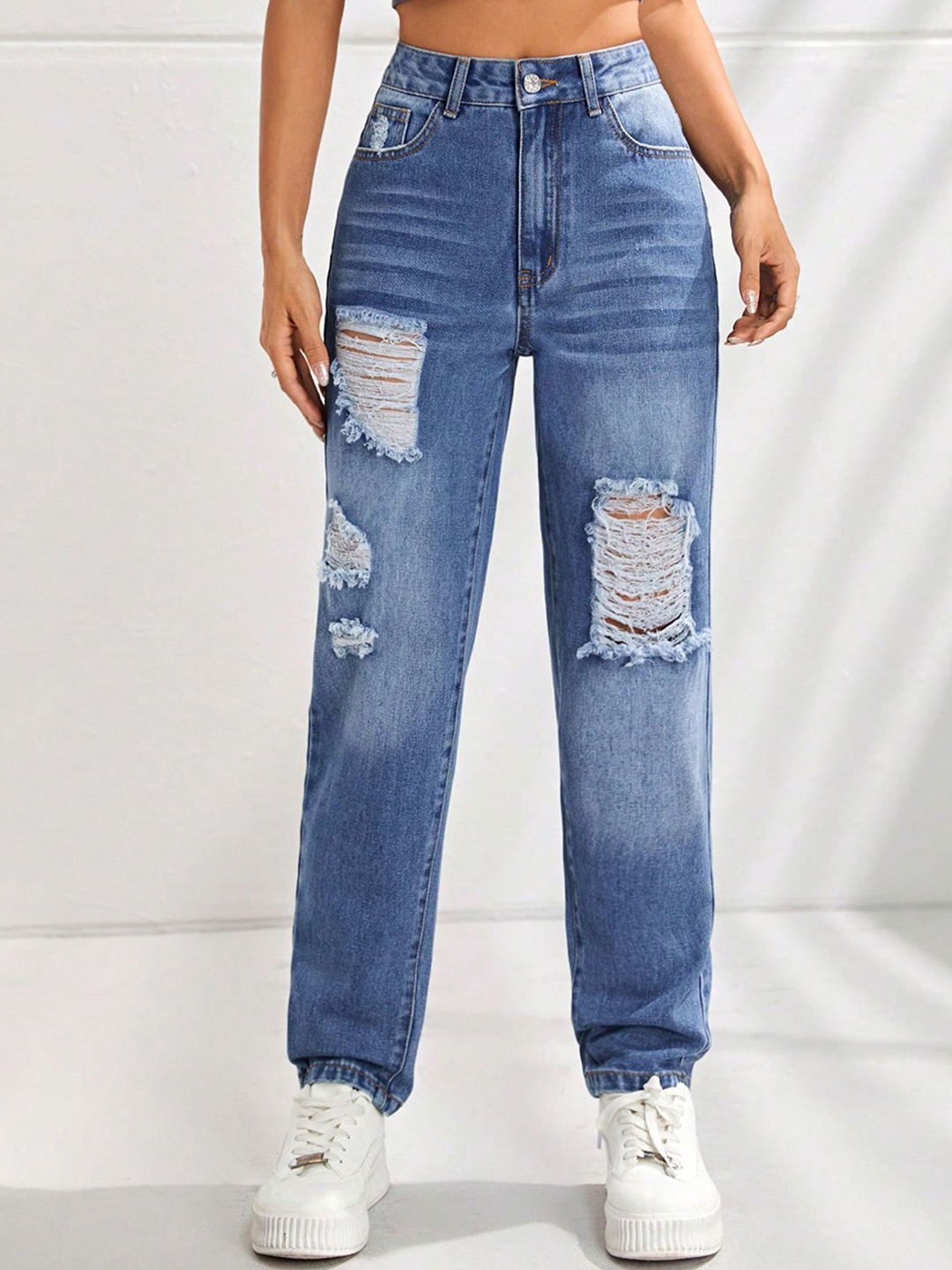 

StyleCast x Revolte Women Highly Distressed Light Fade Jeans, Blue