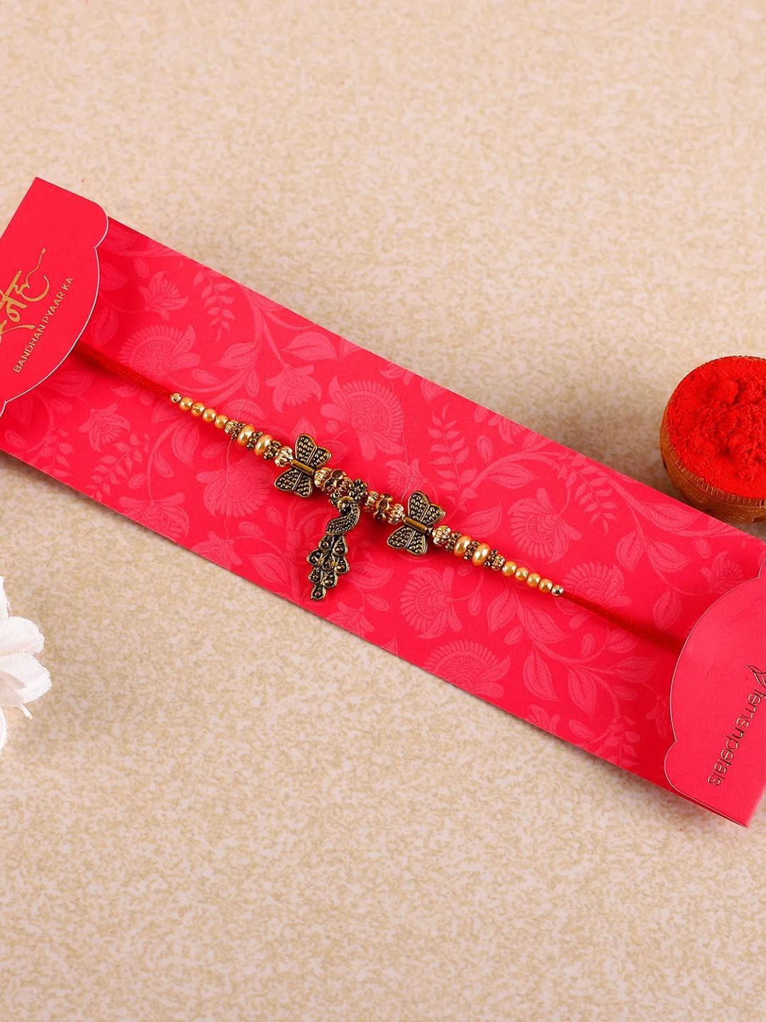 

fnp Beautiful Peacock Design Rakhi Kids Collection, Gold