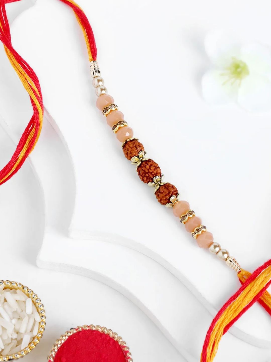 

fnp Peachy Horizon Rudraksha Mauli Rakhi Mauli Rakhis, Red