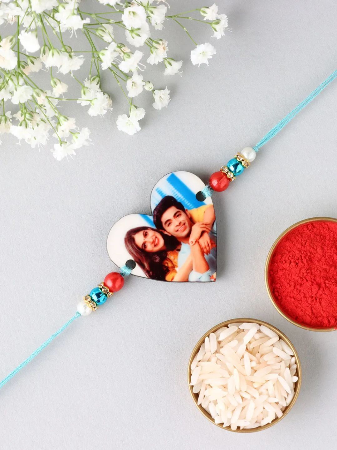 

fnp Extravangant Ethnic Meenakari Rakhi Magical Evil Eye, Blue