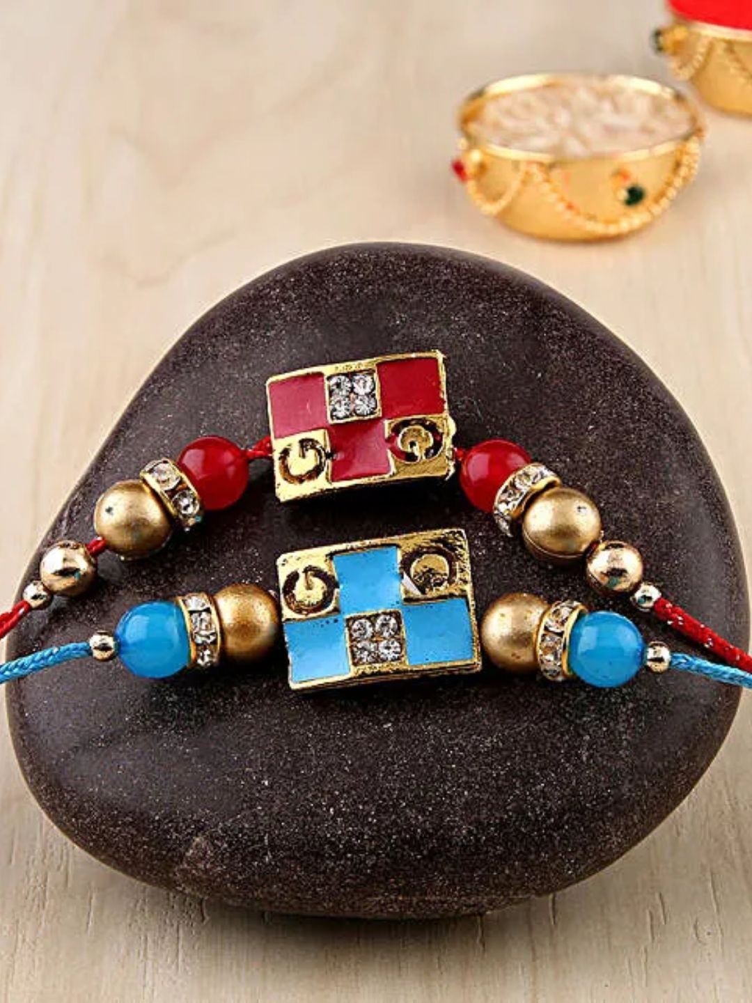 

fnp Sneh Meenakari Rakhi Set of 2 American Diamond, Blue