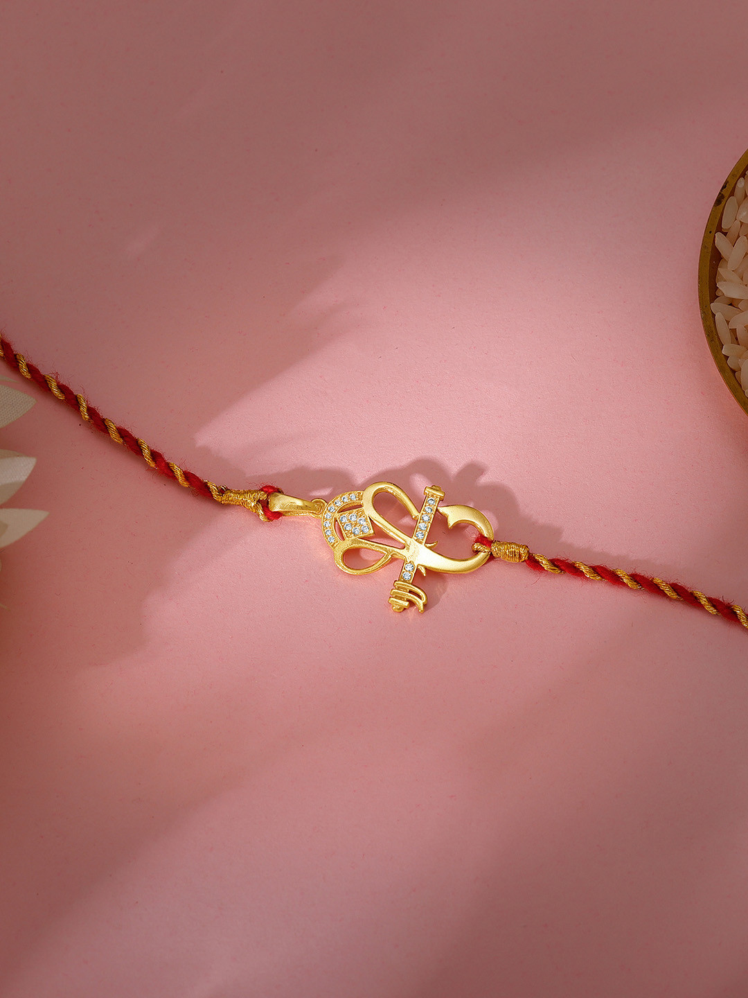 

GIVA 925 Sterling Silver Gold Plated Ganesha Shaped Rakhi with Roli Chawal