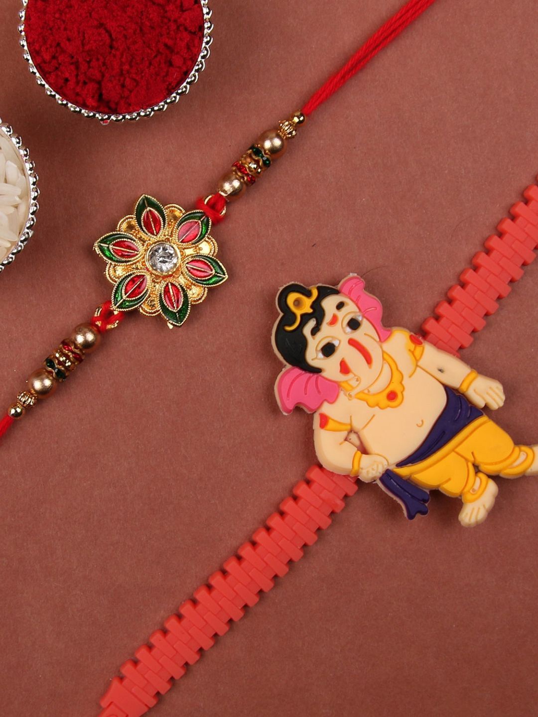 

fnp Kundan Bal Ganesha Rakhi Silver Selections, Red