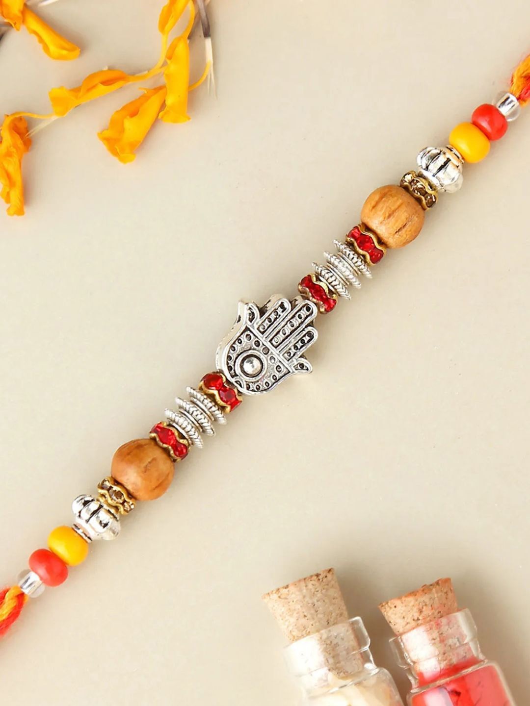 

fnp Glowing Energy Feng Shui Rakhi Lumba Rakhis, Gold