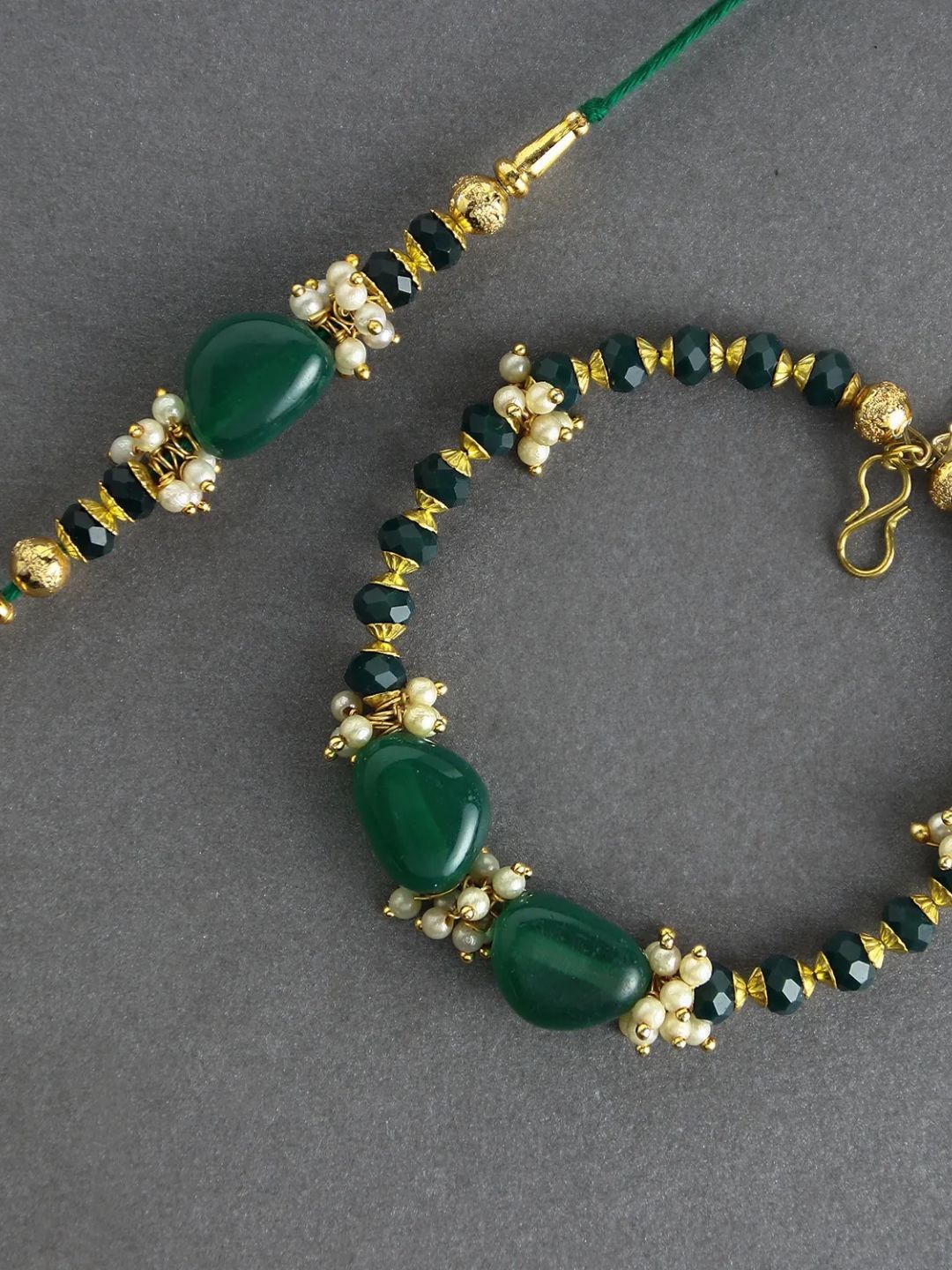 

fnp Enchanted Stone Work Lumba Pearl Rakhi Set Mauli Rakhis, Green