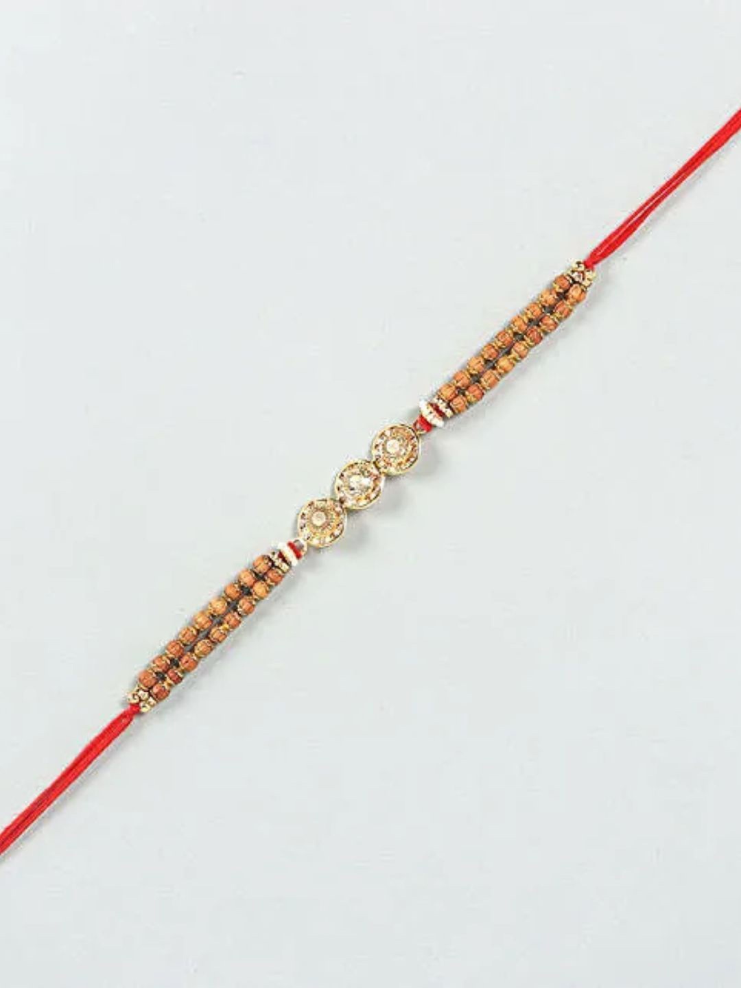 

fnp Sneh Triple Stone Rakhi Lumba Rakhis, Gold