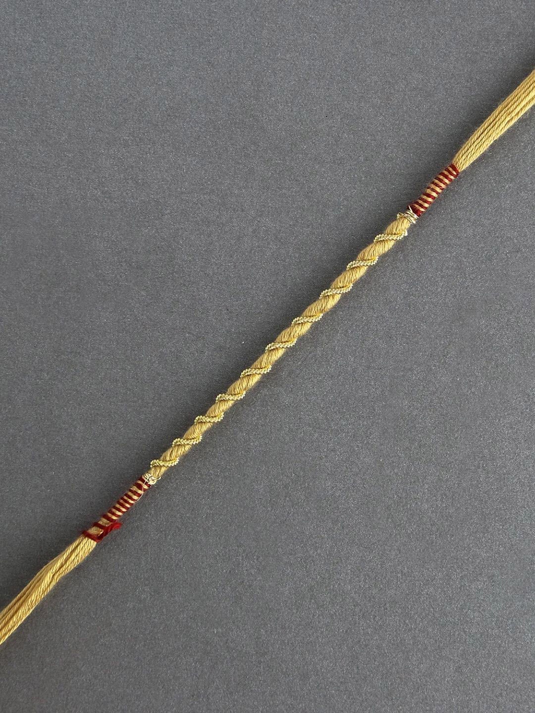

fnp Intertwined Minimalist Dora Rakhi Bracelet Rakhis, Gold