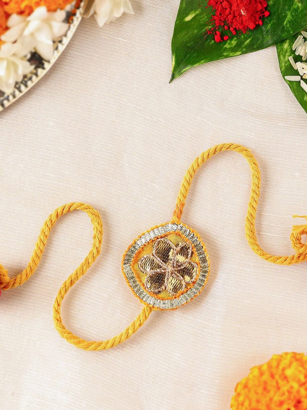 

fnp Blooming Gottapatti Traditional Rakhi Classic Pearls, Yellow