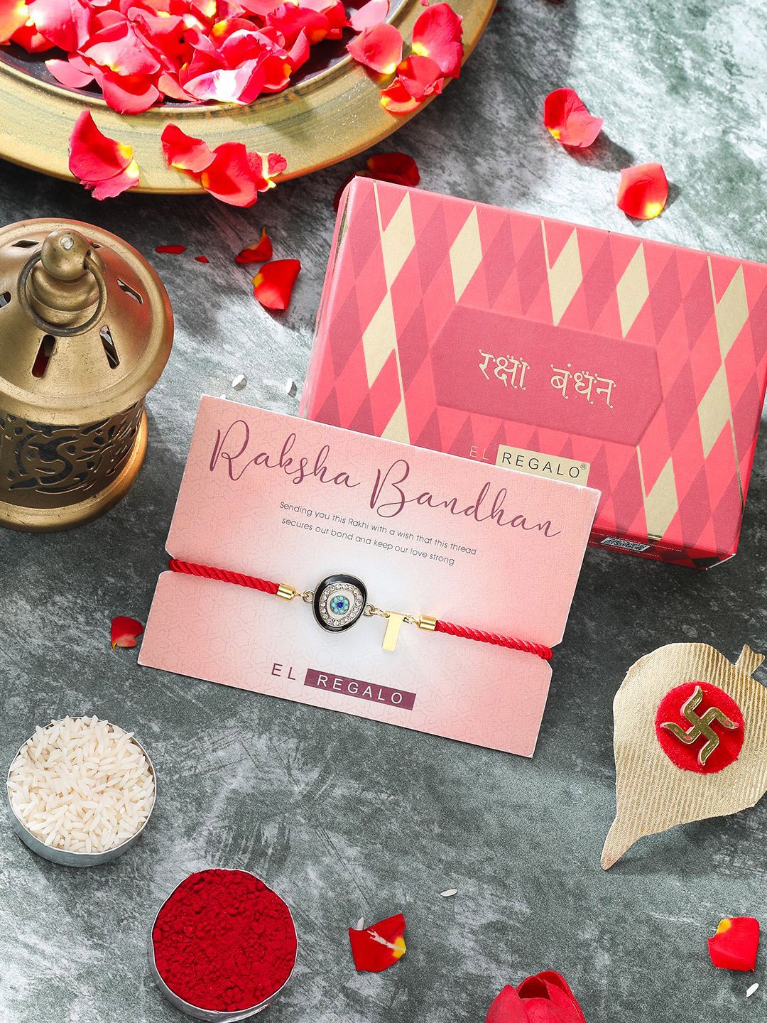 

EL REGALO Stones Studded Name Letter Rakhi With Roli Chawal & Card, Red