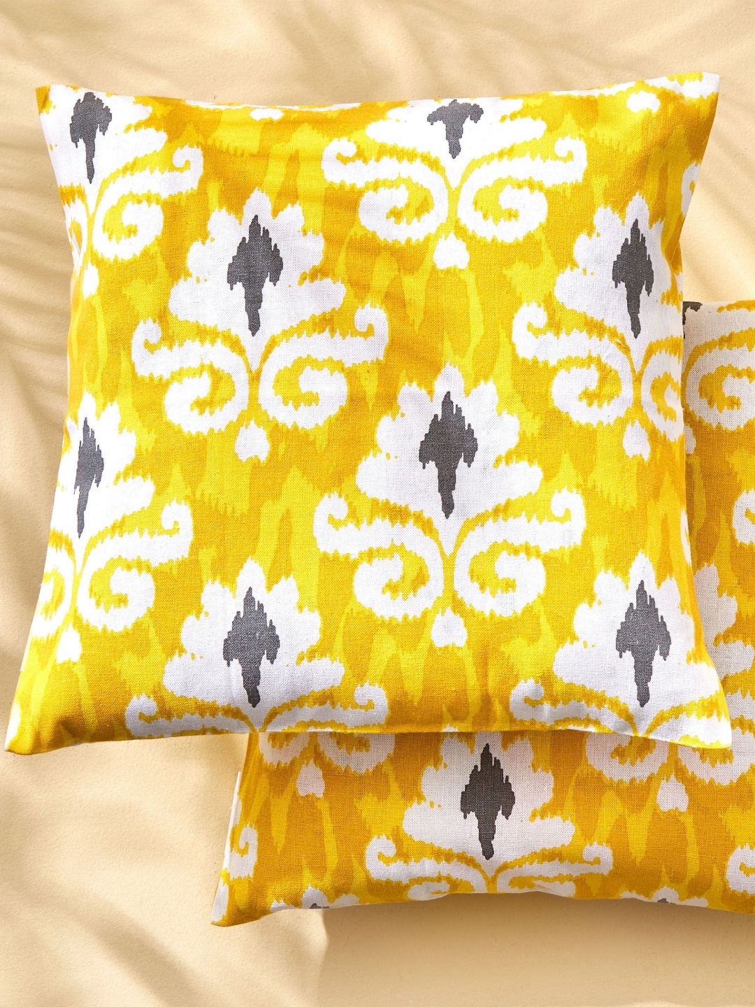 

Home Centre Yellow & White Set of 2 Abstract Square Cushion Covers