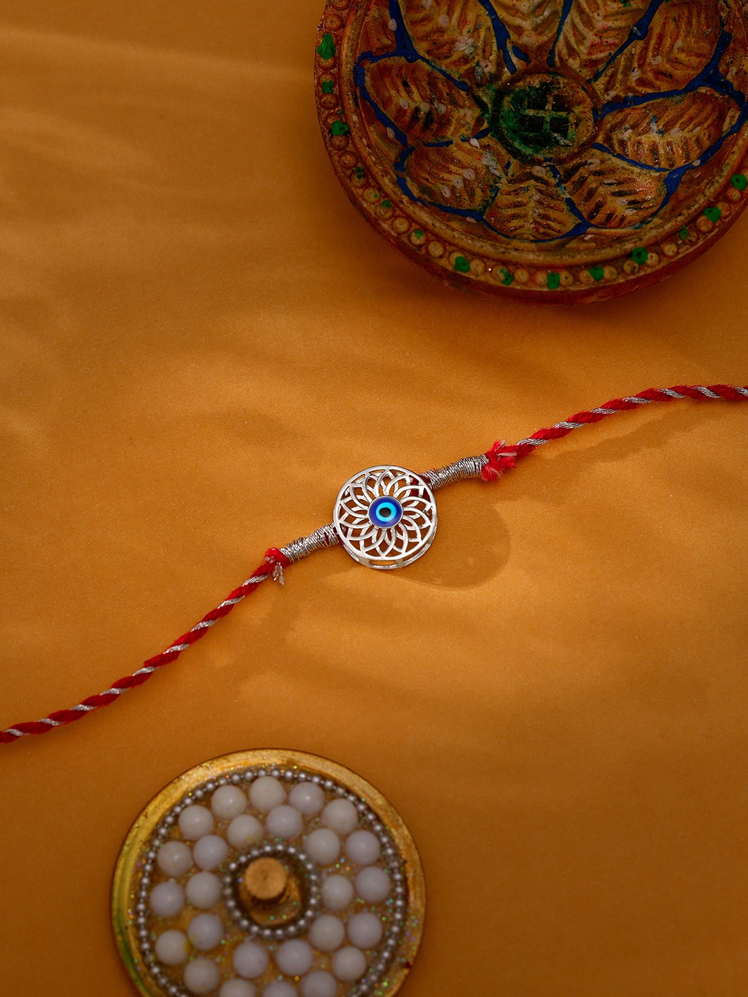 

GIVA 925 Sterling Silver Evil Eye Rakhi with Roli Chawal