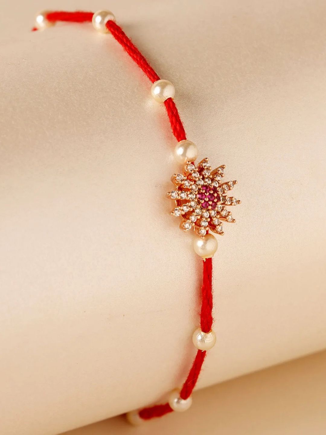 

fnp Shimmering Bloom Beads Rakhi Lumba Rakhis, Red