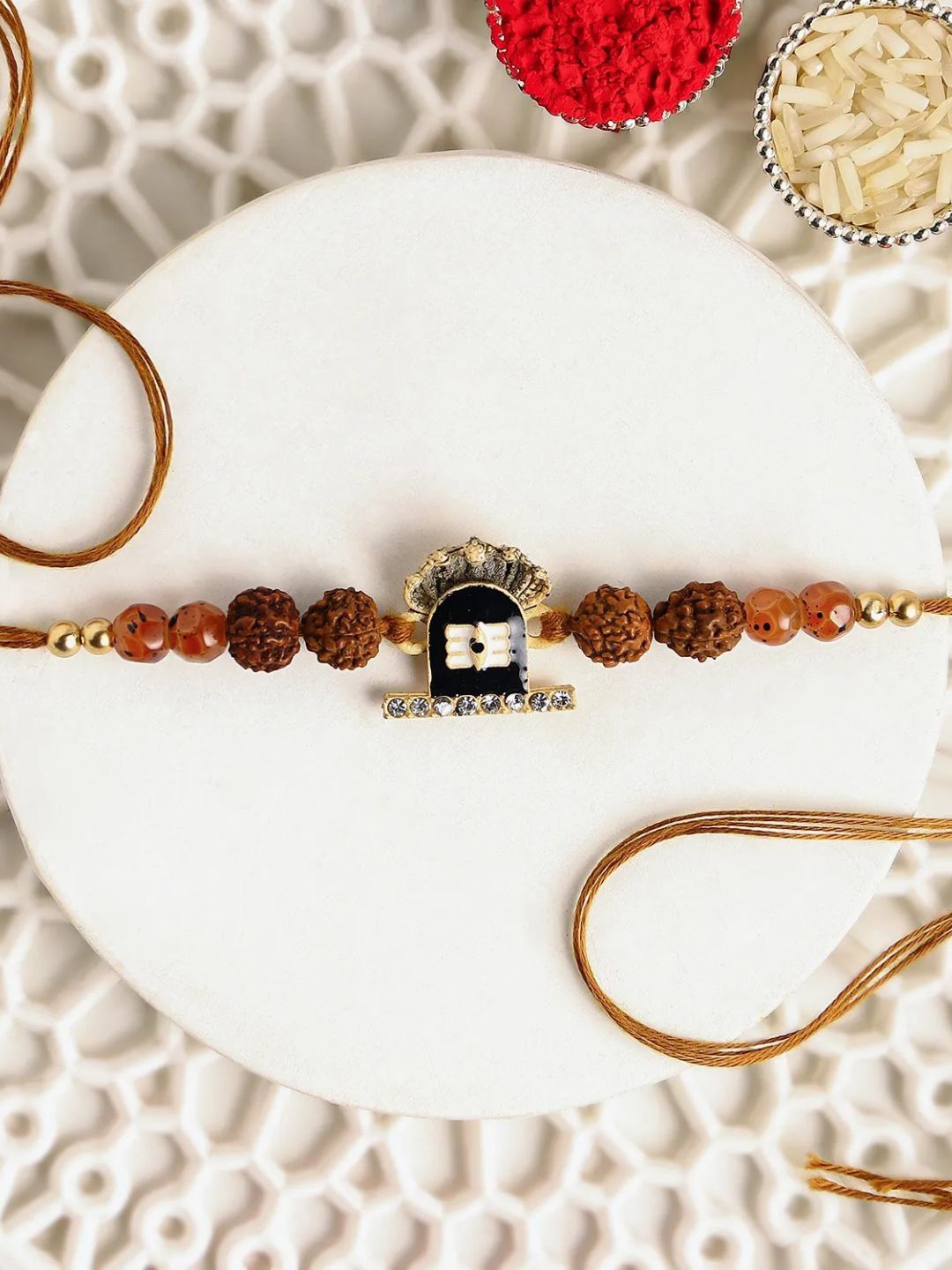 

fnp Blessings of Shiva Rakhi Bhaiya-Bhabhi Rakhis, Brown