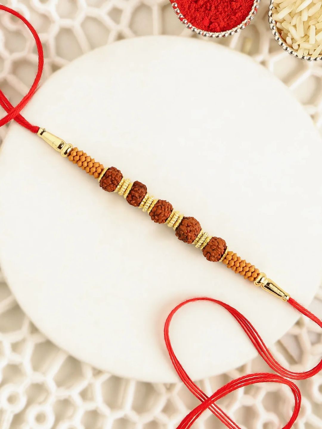 

fnp Celestial Charms Rudraksha Rakhi Bracelet Rakhis, Brown