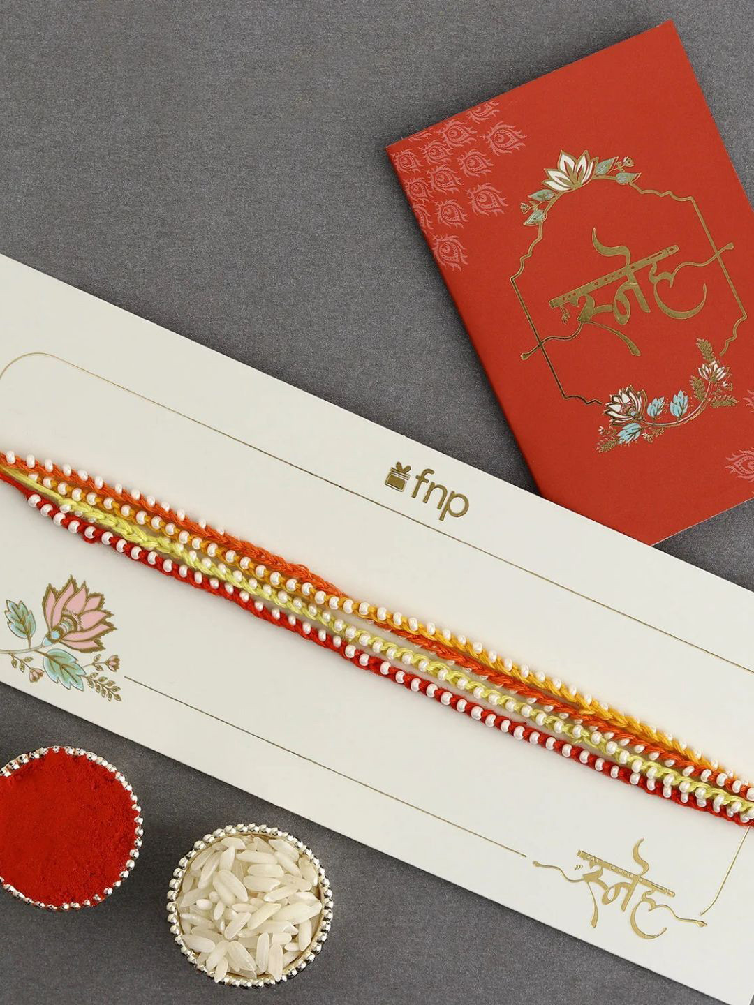 

fnp Simplistic Thread Rakhi Kids Collection, Red