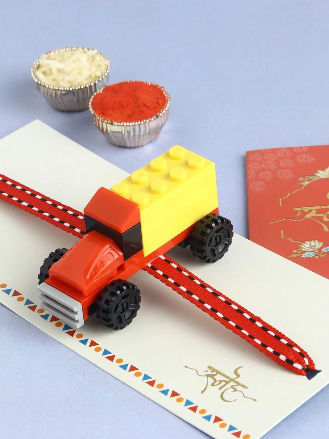 

fnp Lego Link Kids Toy Rakhi Magical Evil Eye, Red