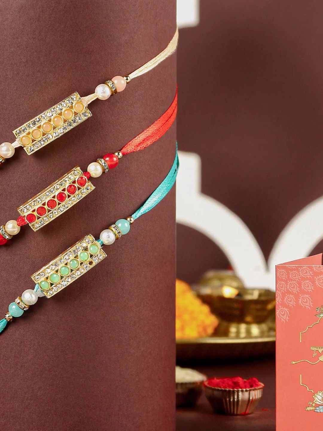

fnp Ethnic Stone Stone Lumba Rakhis, Red