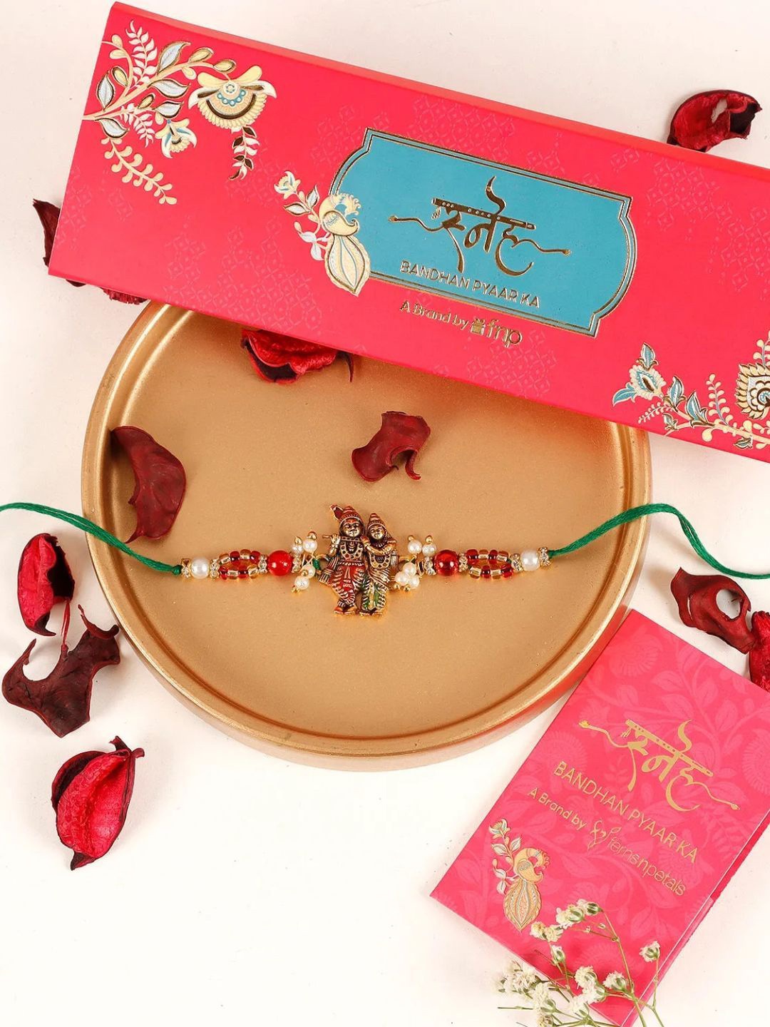 

fnp Spectrum Pearl Radha Krishna Rakhi Lumba Rakhis, Green