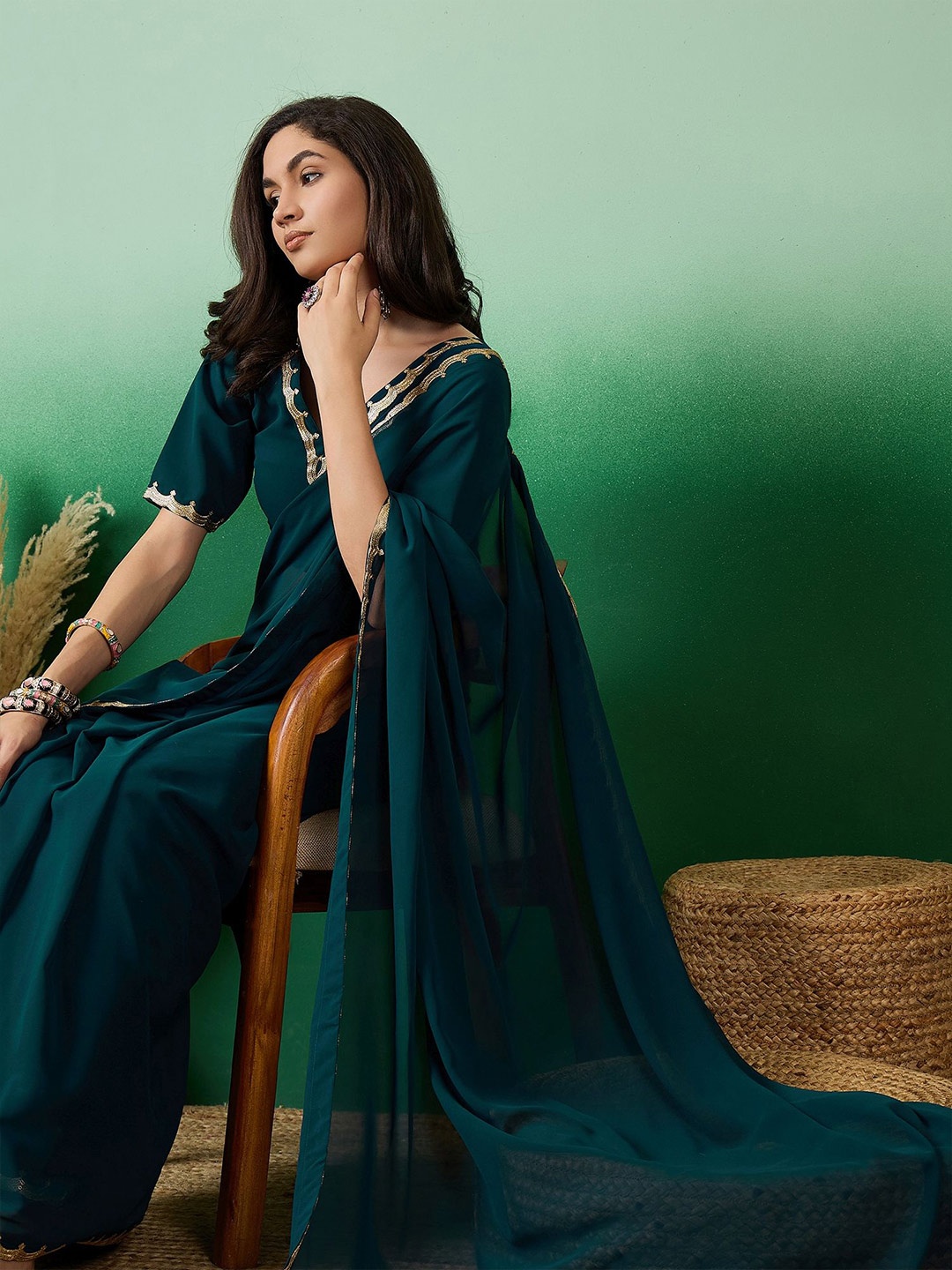 

Sangria Solid Embroidered Bordered Poly Georgette Sarees, Teal