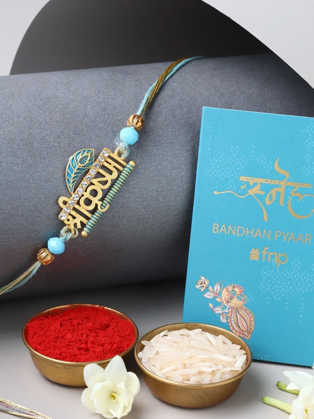 

fnp Krishna Rakhi Divine Traditional Kundan, Gold