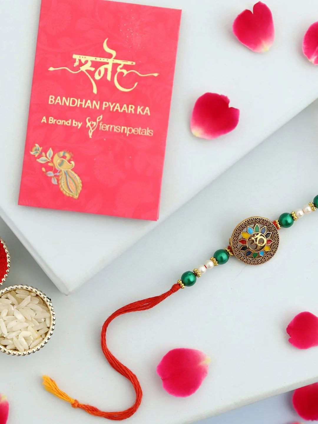 

fnp Prismatic Heritage Pearl Rakhi Traditional Kundan, Green