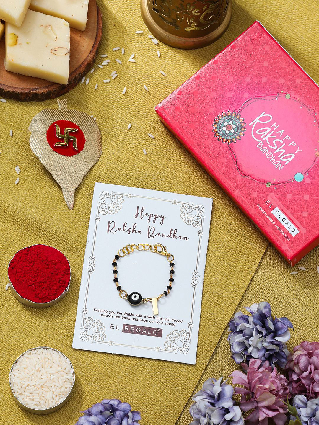 

EL REGALO T Letter Charm Rakhi Gift Set, Gold