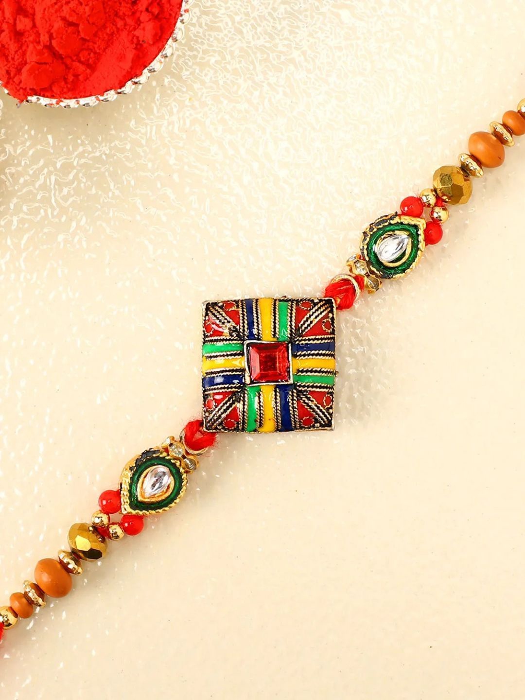 

fnp Artisanal Meenakari Rakhi Classic Pearls, Gold