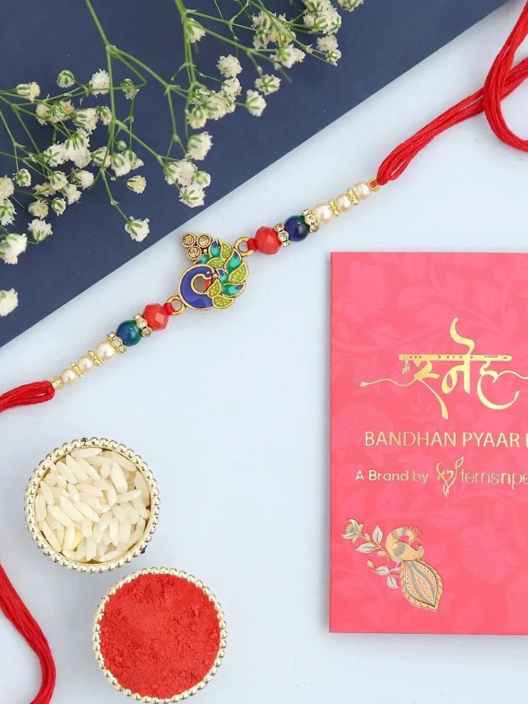 

fnp Rakhi Crimson Charm American Diamond, Gold