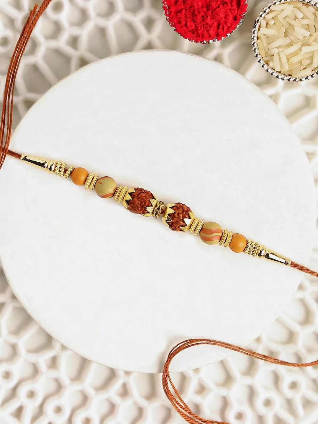 

fnp Ethereal Rudraksha Guardian Rakhi Traditional Kundan, Gold