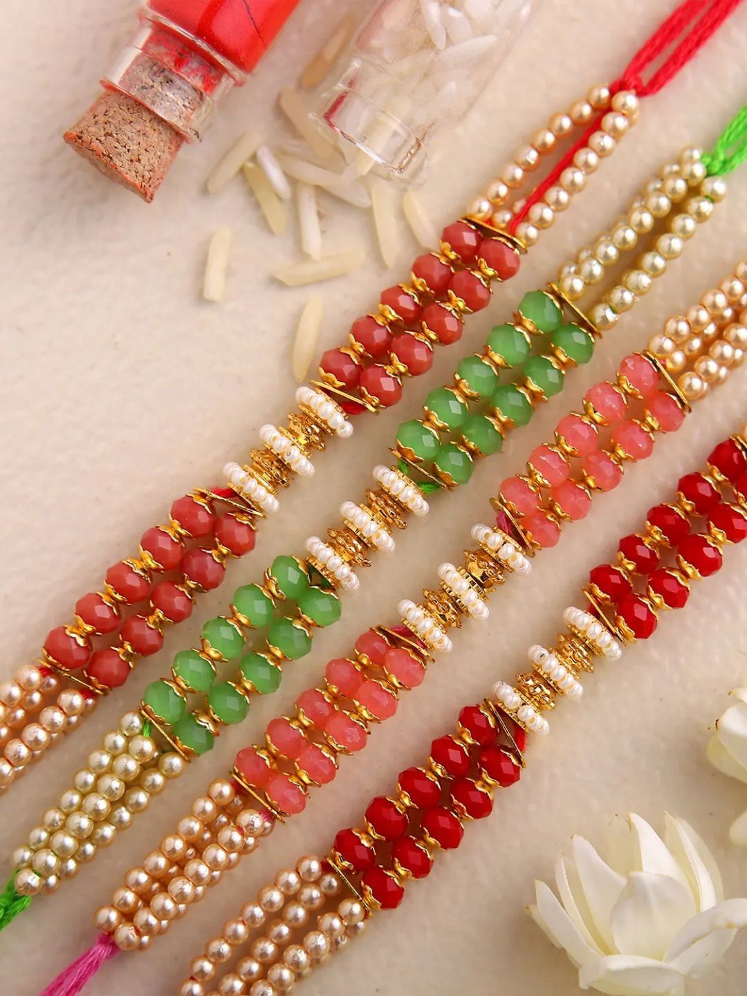 

fnp Set of 4 Pretty Pearls Special Rakhi Silver Selections, Red