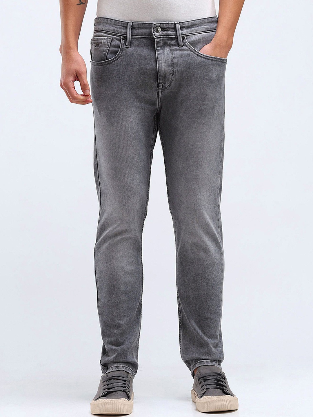 

Flying Machine Men Tapered Fit Low Distress Heavy Fade Stretchable Jeans, Grey