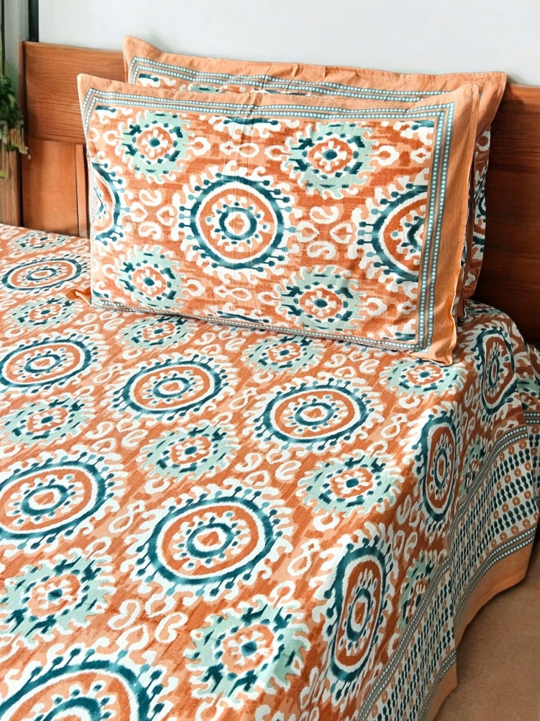 

Feels Like Home Orange & Blue Ethnic Motifs 210 TC King Bedsheet with 2 Pillow Covers