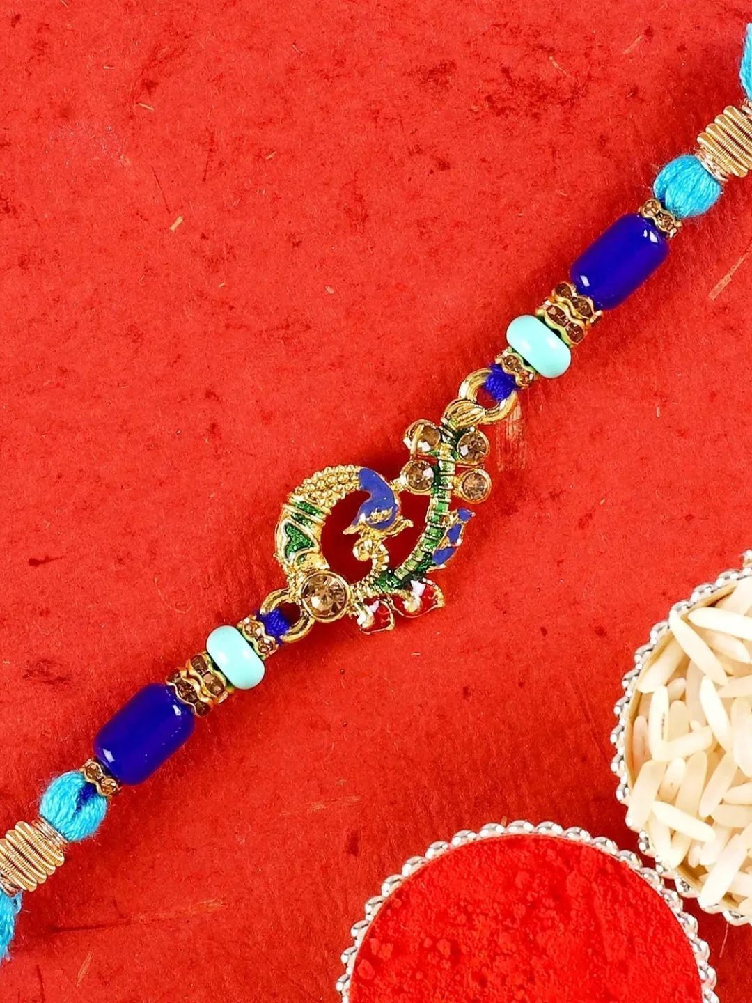 

fnp Traditional Peacock Rakhi Mauli Rakhis, Blue