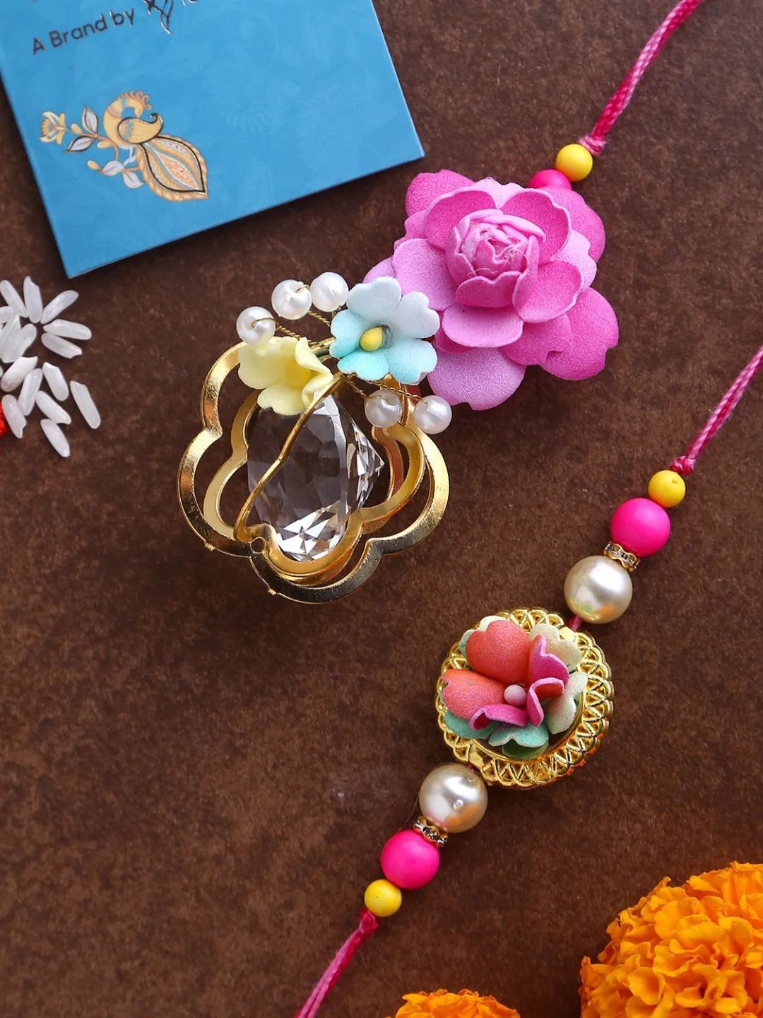 

fnp Pretty Bhaiya Bhabhi Rose Rakhi Set Bhaiya-Bhabhi Rakhis, Pink