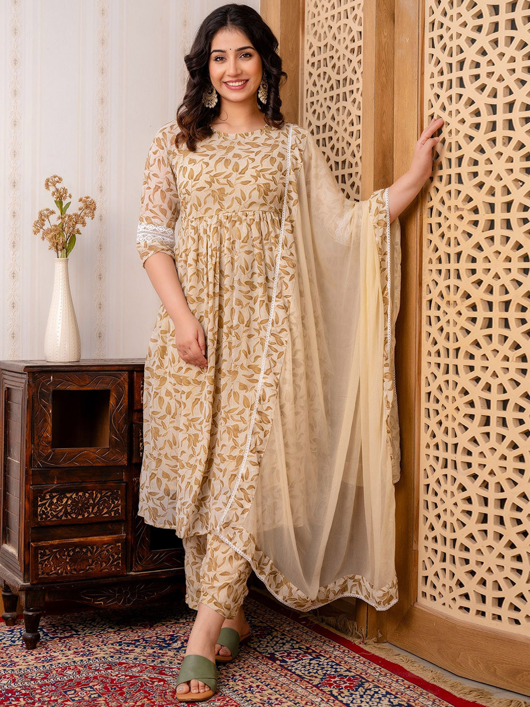 

CELEBRAVO Women Floral Printed Tiered Kurta with Trousers & With Dupatta, Beige