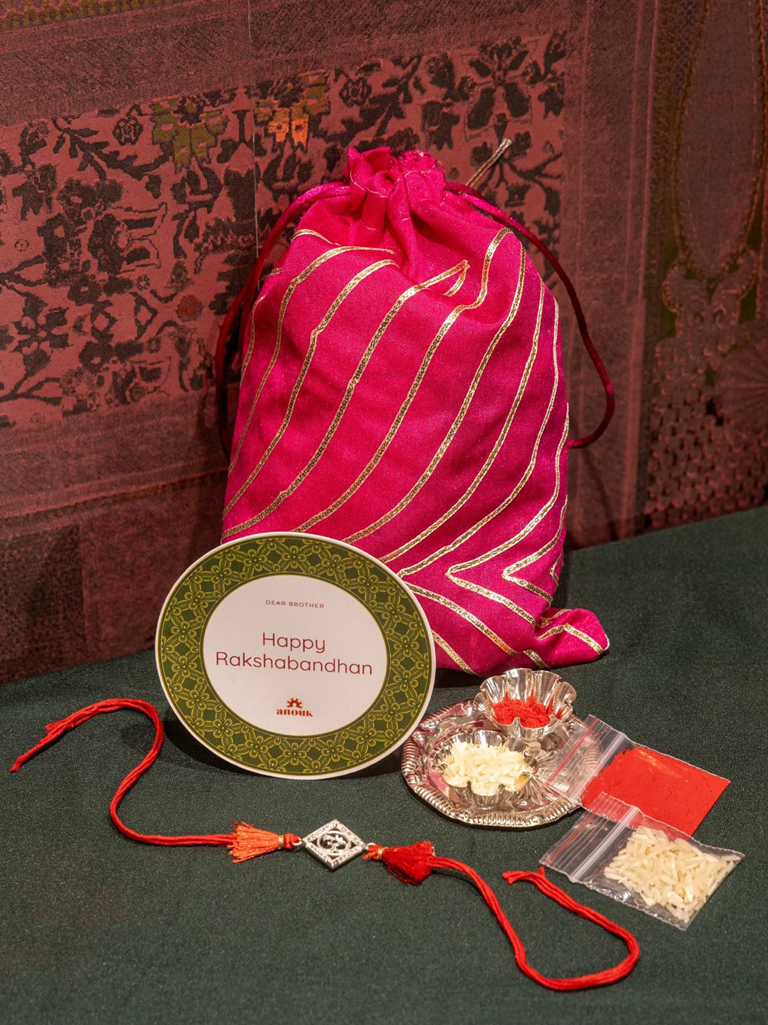 

Anouk 925 Silver Swastik Rakhi Gift Set, Red