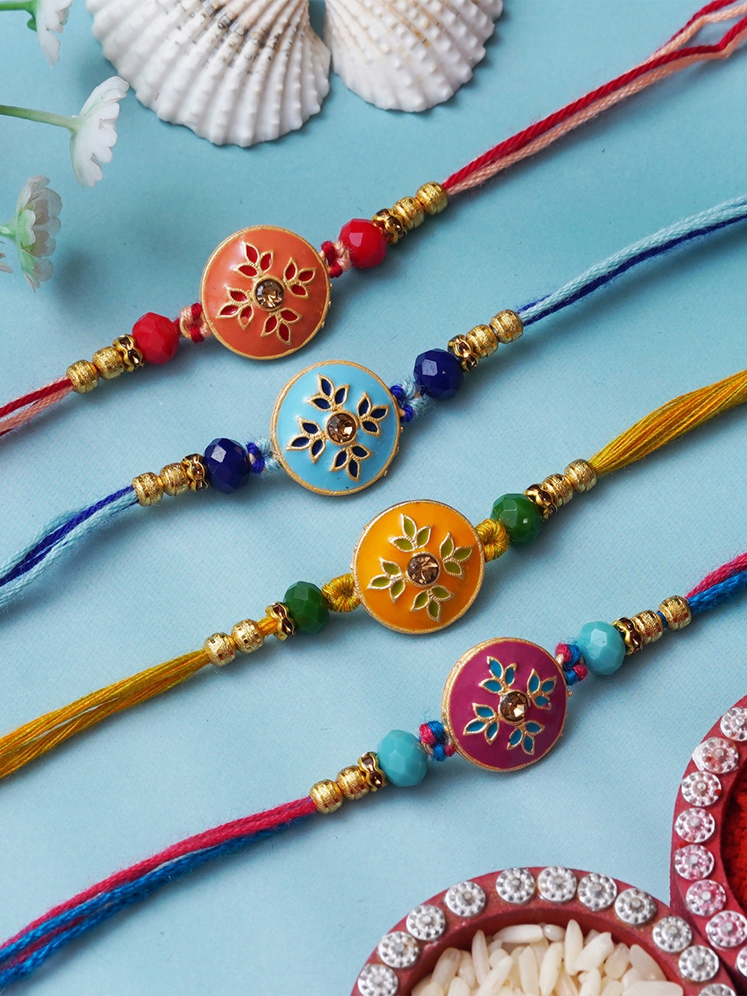 

eCraftIndia Set of 4 Floral-Shaped Designer Rakhis with Roli & Chawal, Multi