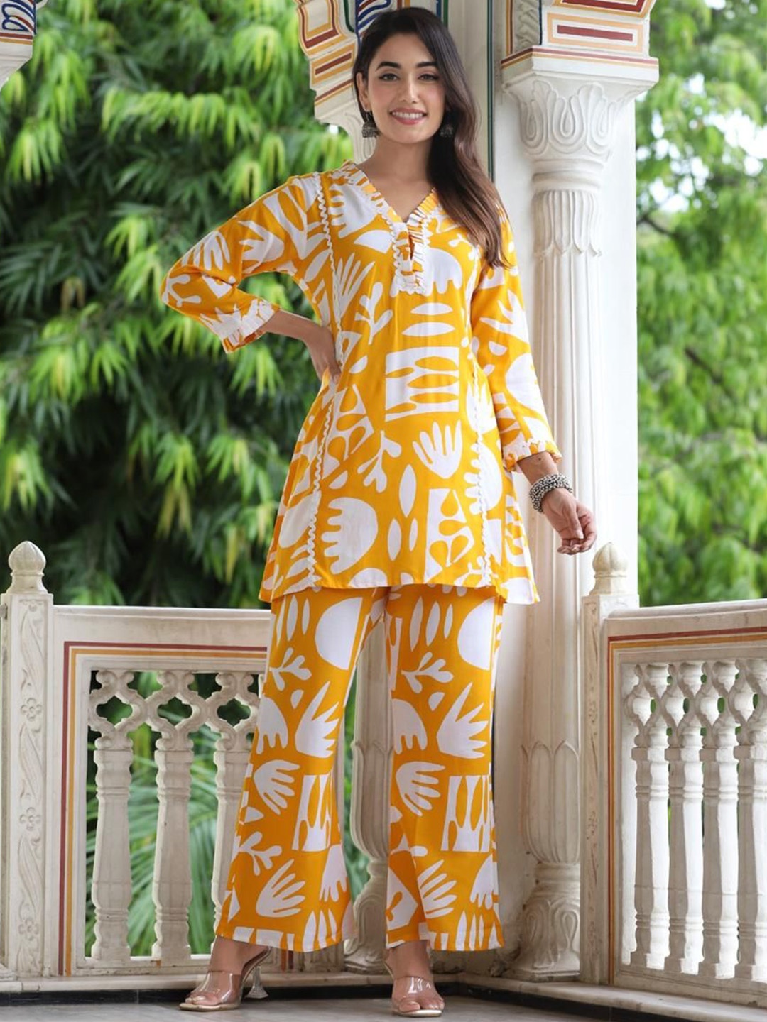 

KALINI Women Ethnic Motifs Printed Regular Thread Work Kurti with Palazzos, Yellow