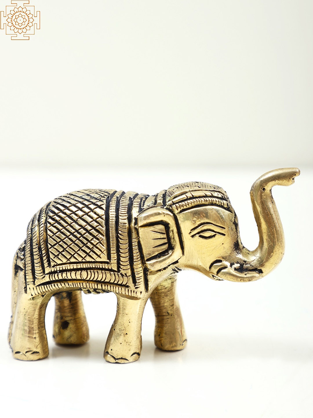 

Exotic India Gold-Toned Elephant Figurine Brass Showpiece