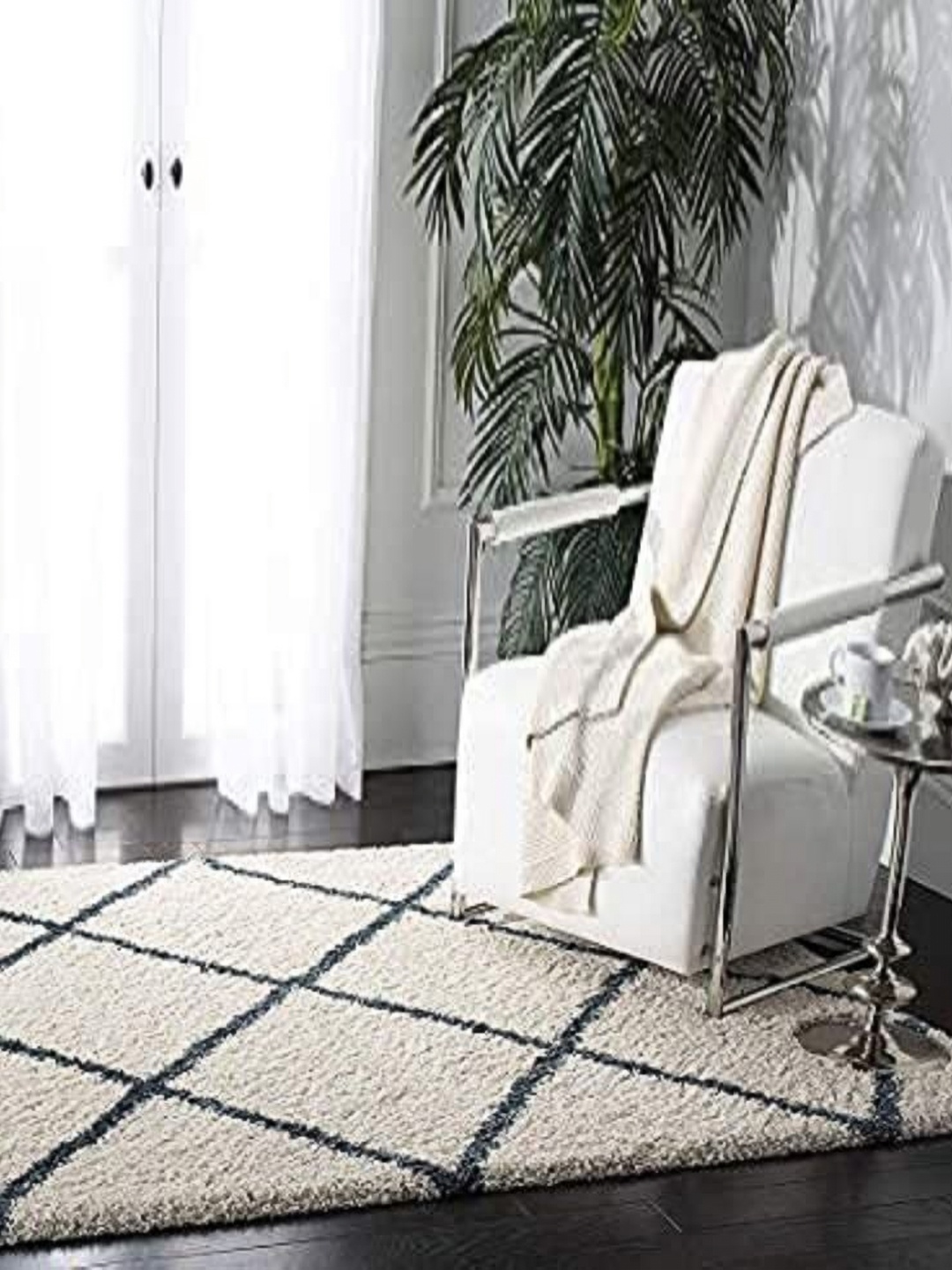 

Banchmark Home Furnishings White Geometric Handmade Polypropylene Carpet