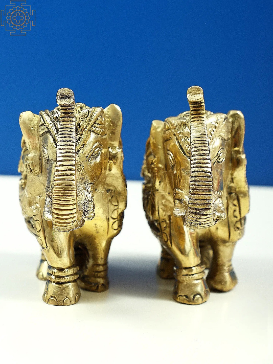 

Exotic India Gold-Toned 2 Pieces Engraved Figurine Showpieces