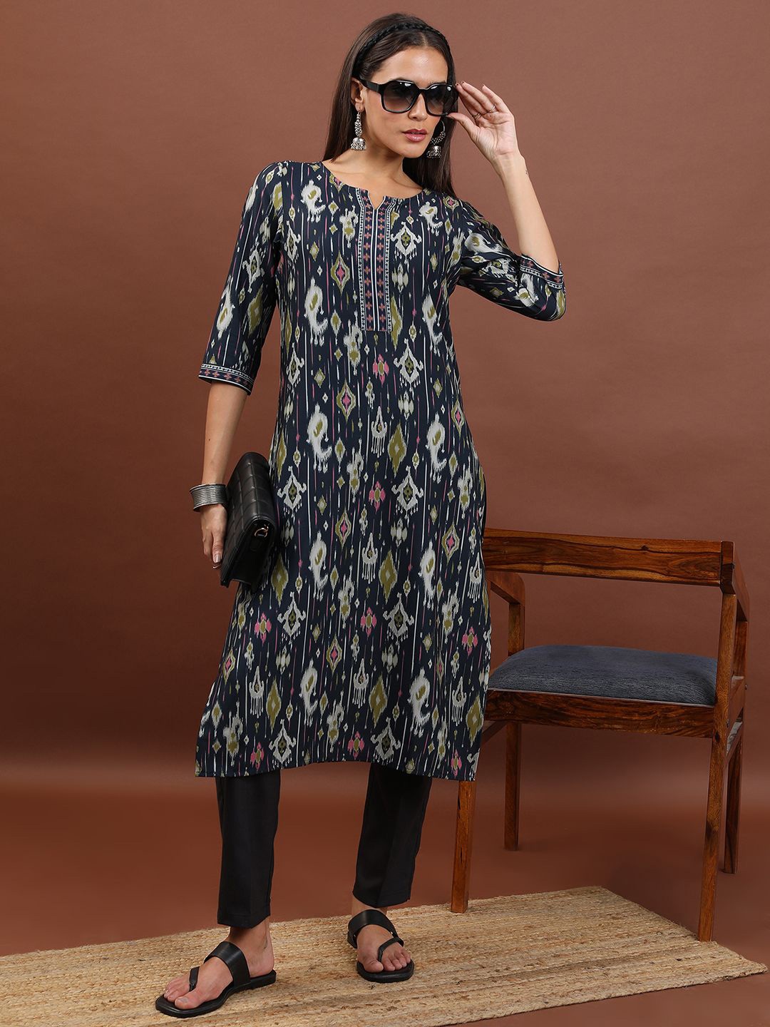 

Vishudh Women Ethnic Motifs Printed Flared Sleeves Thread Work Kurta, Blue