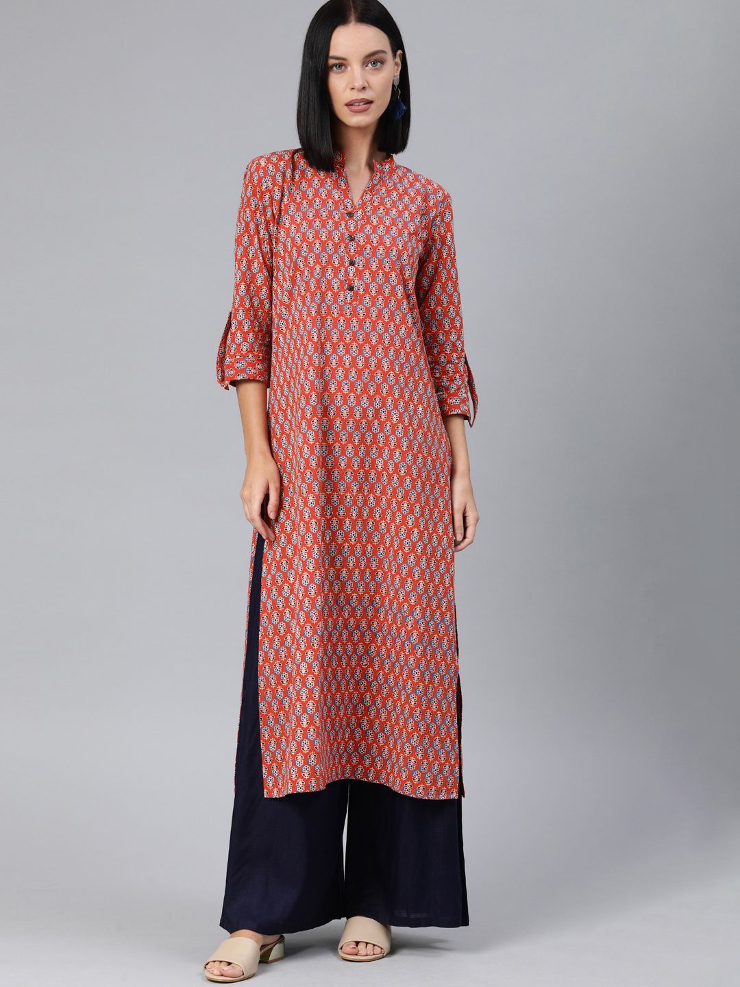 

Swishchick Women Geometric Printed Thread Work Kurta, Orange