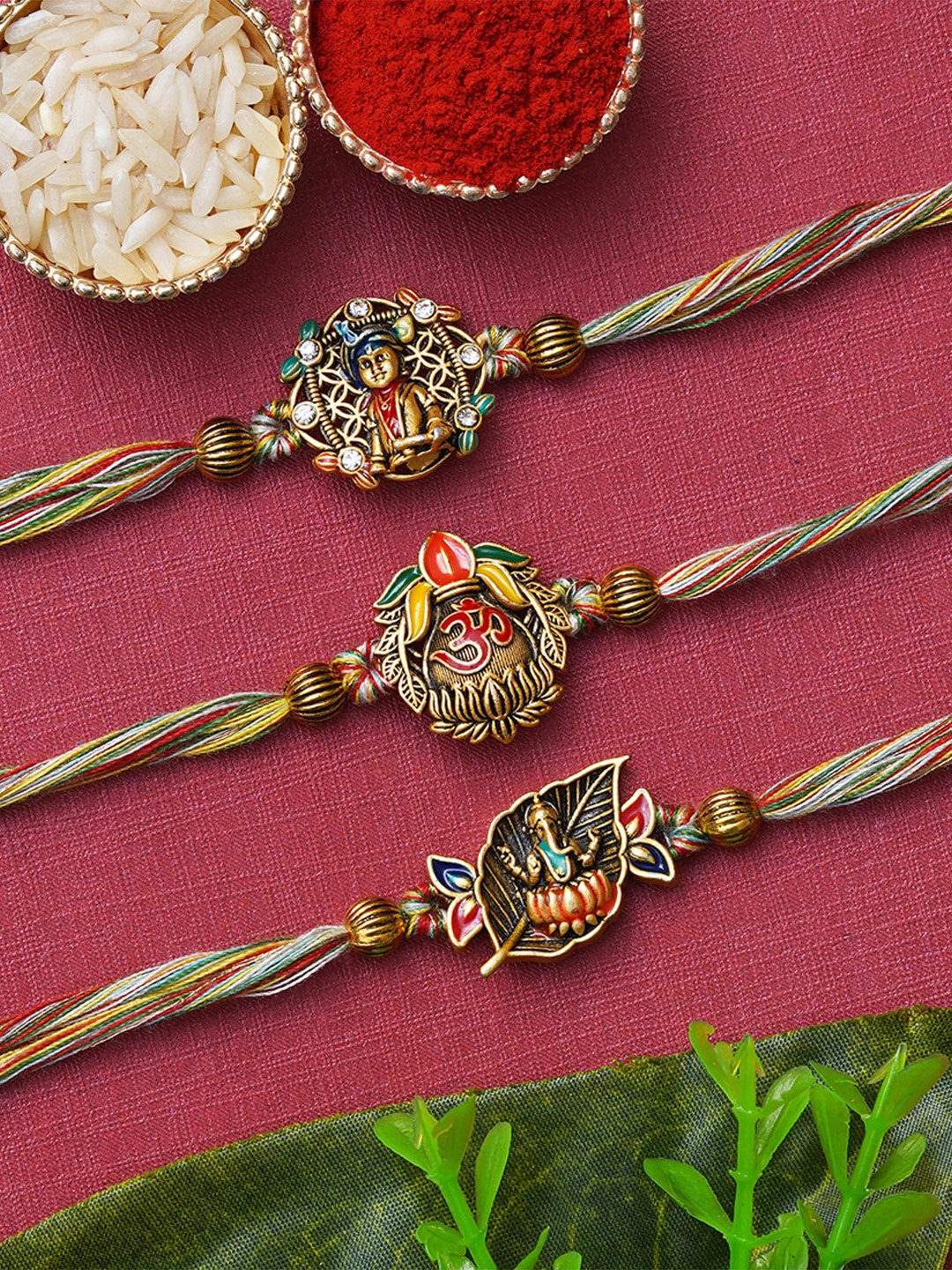 

eCraftIndia Set of 3 Lord Ganesha, Lord Krishna & Om Symbol Rakhis with Roli & Chawal, Red