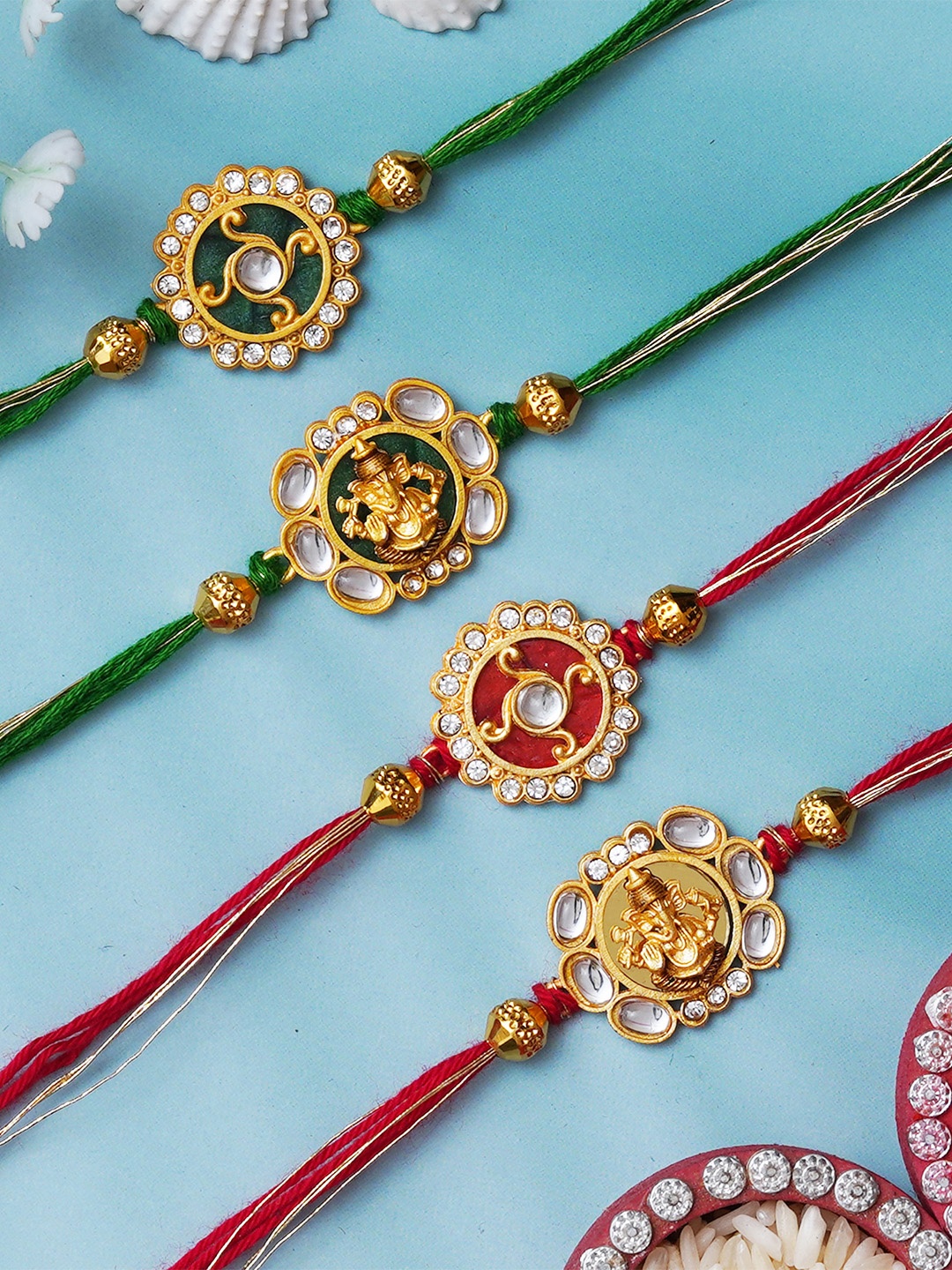 

eCraftIndia Set of 4 Kundan-Studded Designer Rakhis with Roli & Chawal, Red