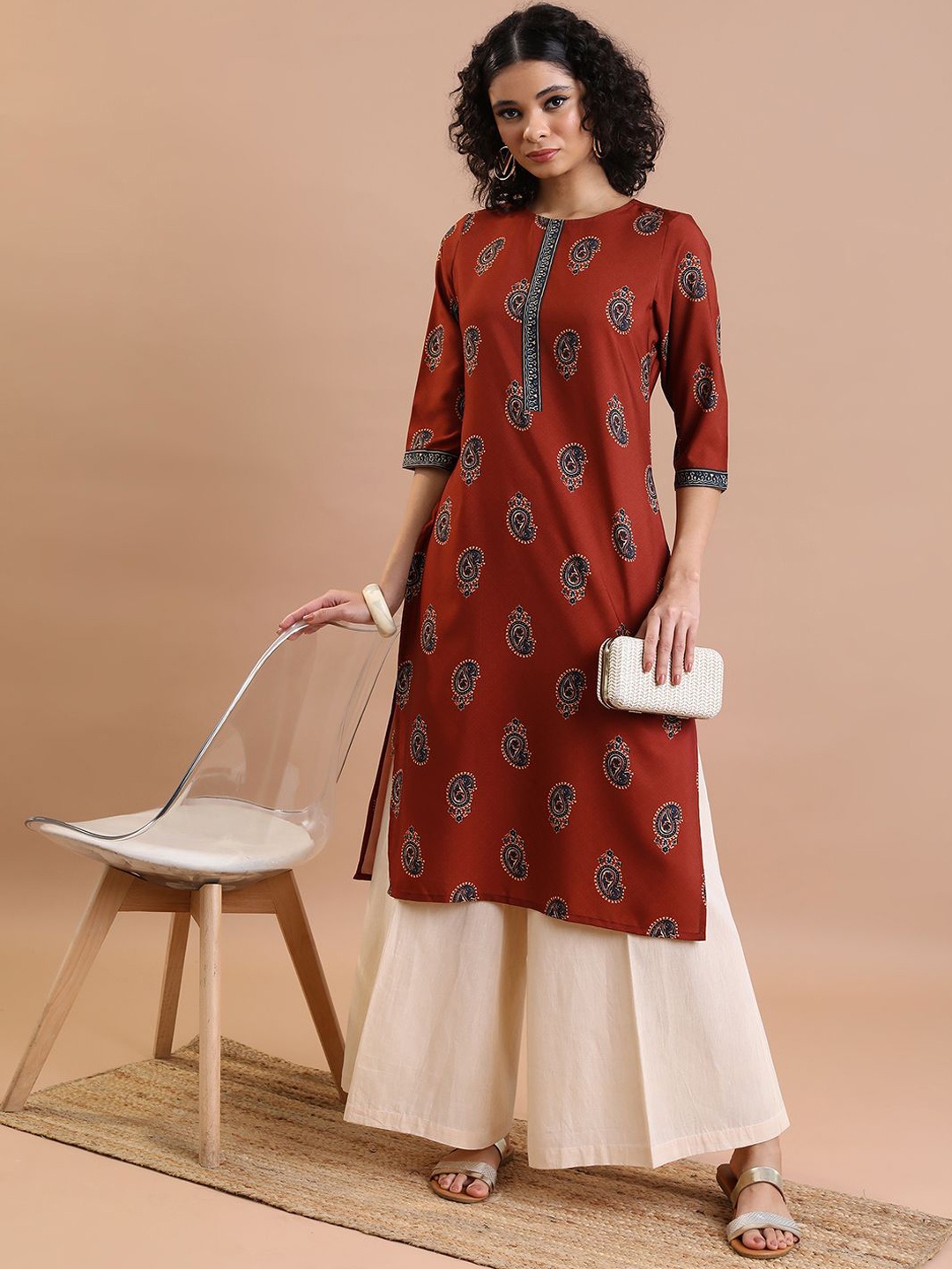 

Vishudh Women Ethnic Motifs Embellished Flared Sleeves Kurta, Rust